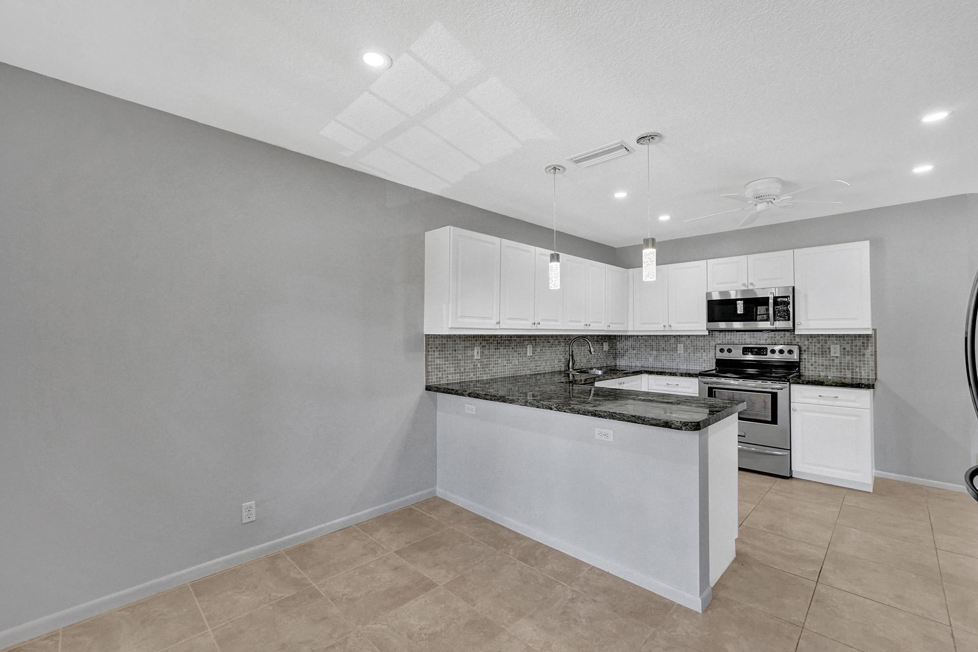 6761 Montego Bay Boulevard, Unit D Boca Raton, FL 33433 - Photo 13 of 38 Kitchen