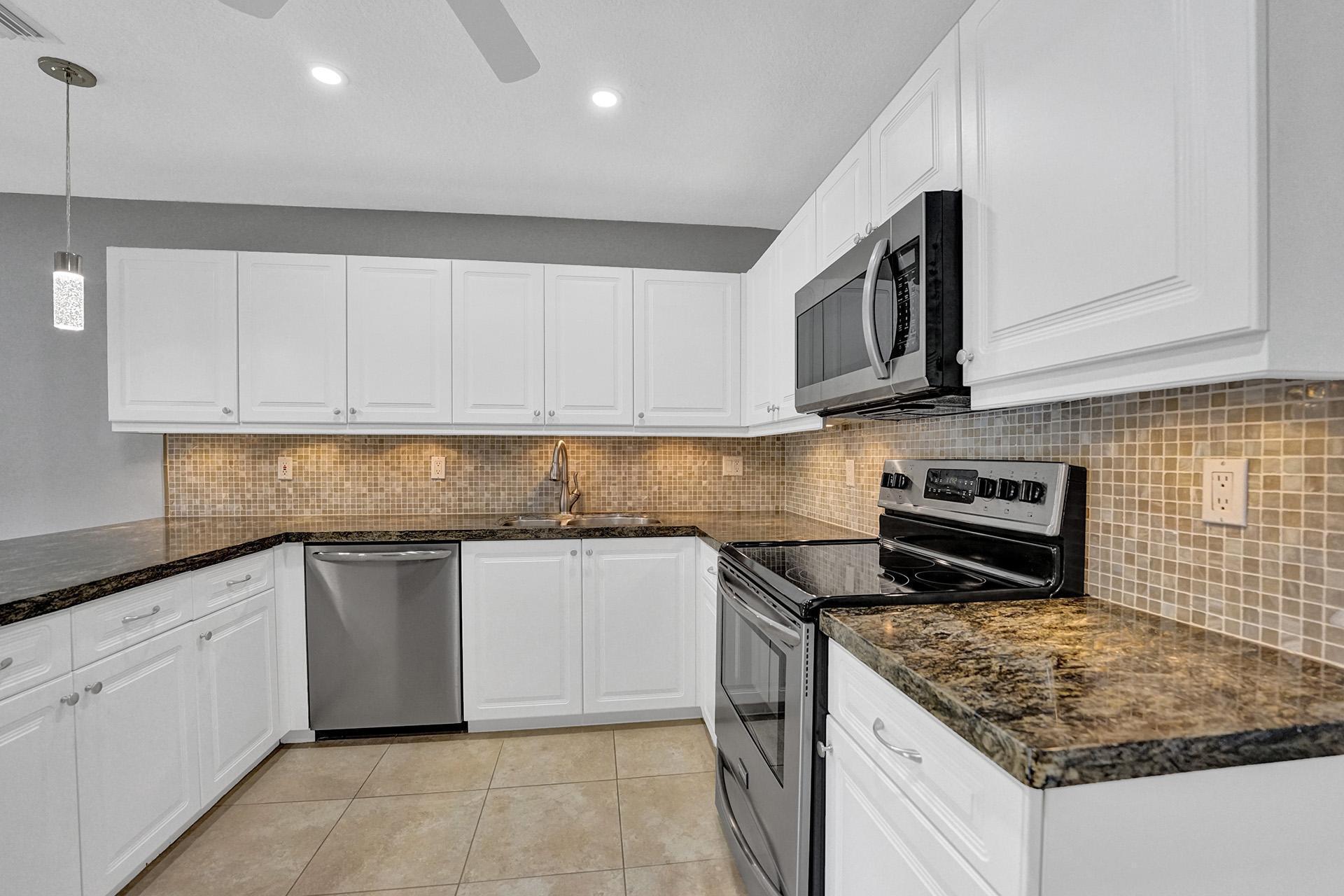 6761 Montego Bay Boulevard, Unit D Boca Raton, FL 33433 - Photo 14 of 38 Kitchen