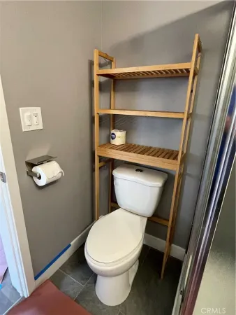 a bathroom with a toilet and a sink