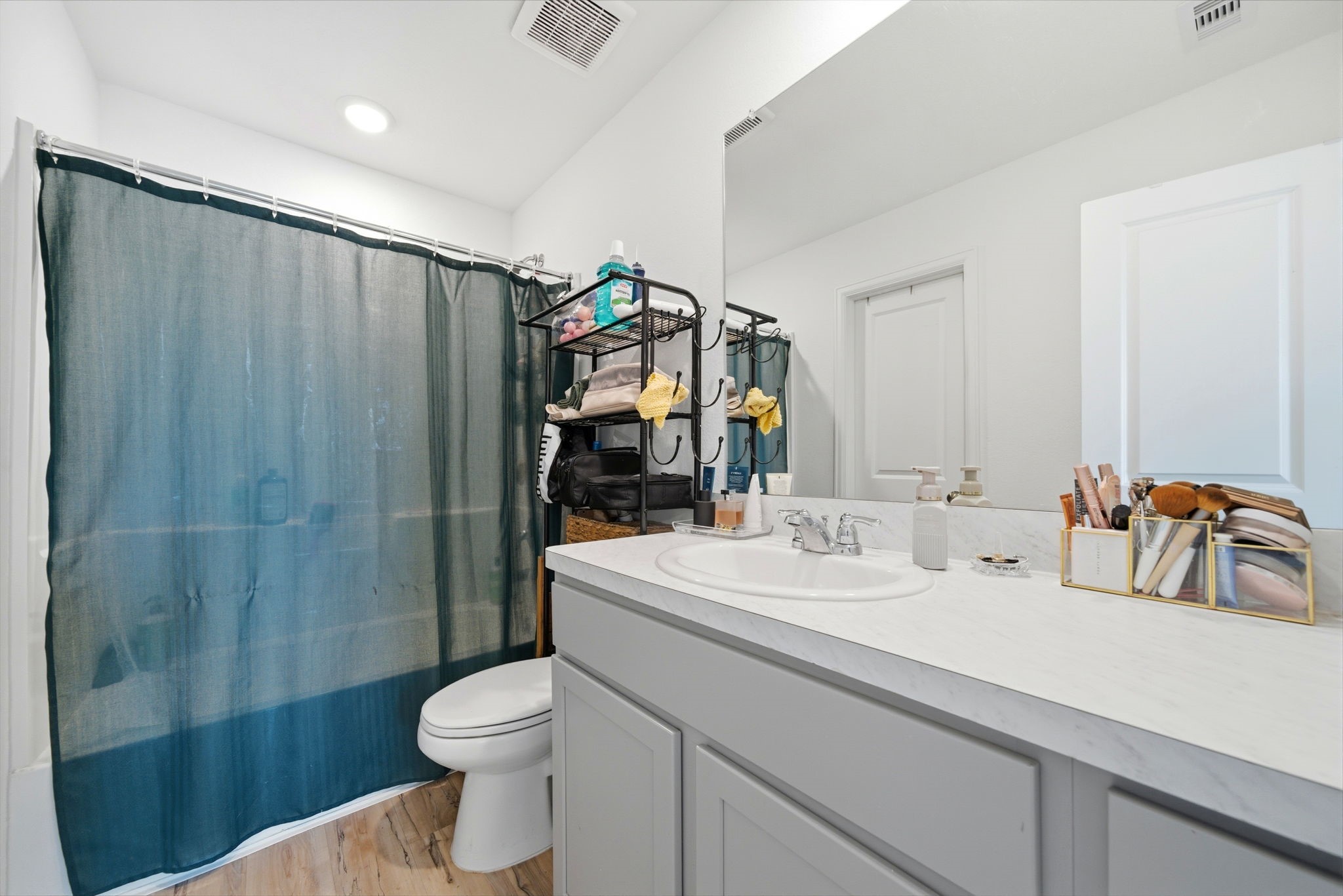 14502 Woodcott Warren Way Rosharon, TX 77583 - Photo 21 of 29 Designed for comfort and functionality, the primary bath offers seamless access to an impressive walk-in closet.