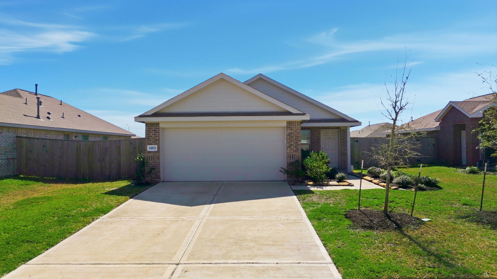 14502 Woodcott Warren Way Rosharon, TX 77583 - Photo 24 of 29 Spacious double-width driveway adds both function and ease for homeowners and guests