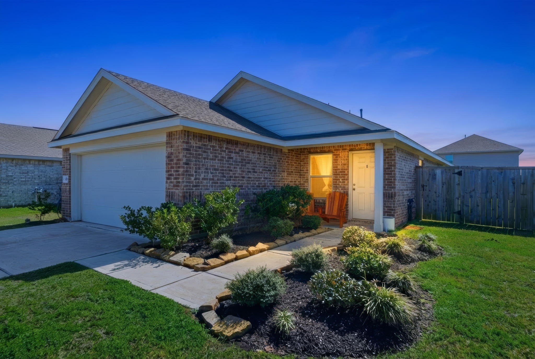 14502 Woodcott Warren Way Rosharon, TX 77583 - Photo 4 of 30 Timeless curb appeal welcomes you into this beautifully maintained four-bedroom home built in 2022.
