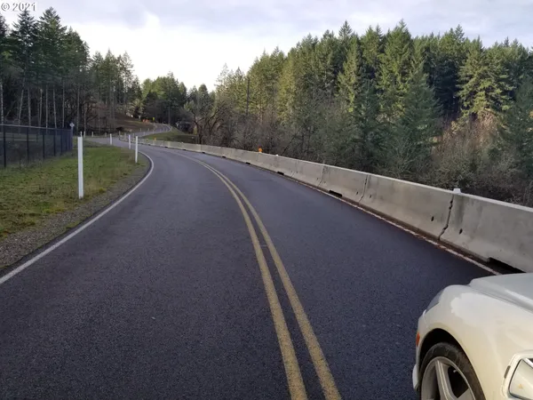 a view of a back yard from a balcony