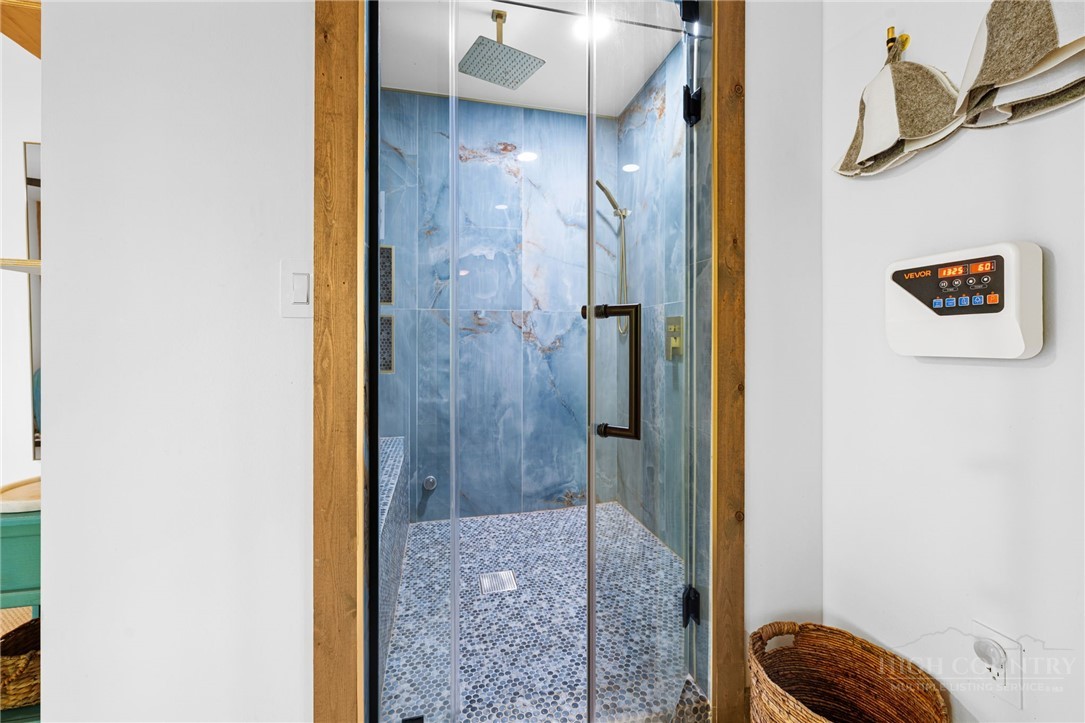 1385 Niley Cook Road Blowing Rock, NC 28605 - Photo 29 of 40 a view of a hallway with a livingroom and a bathroom
