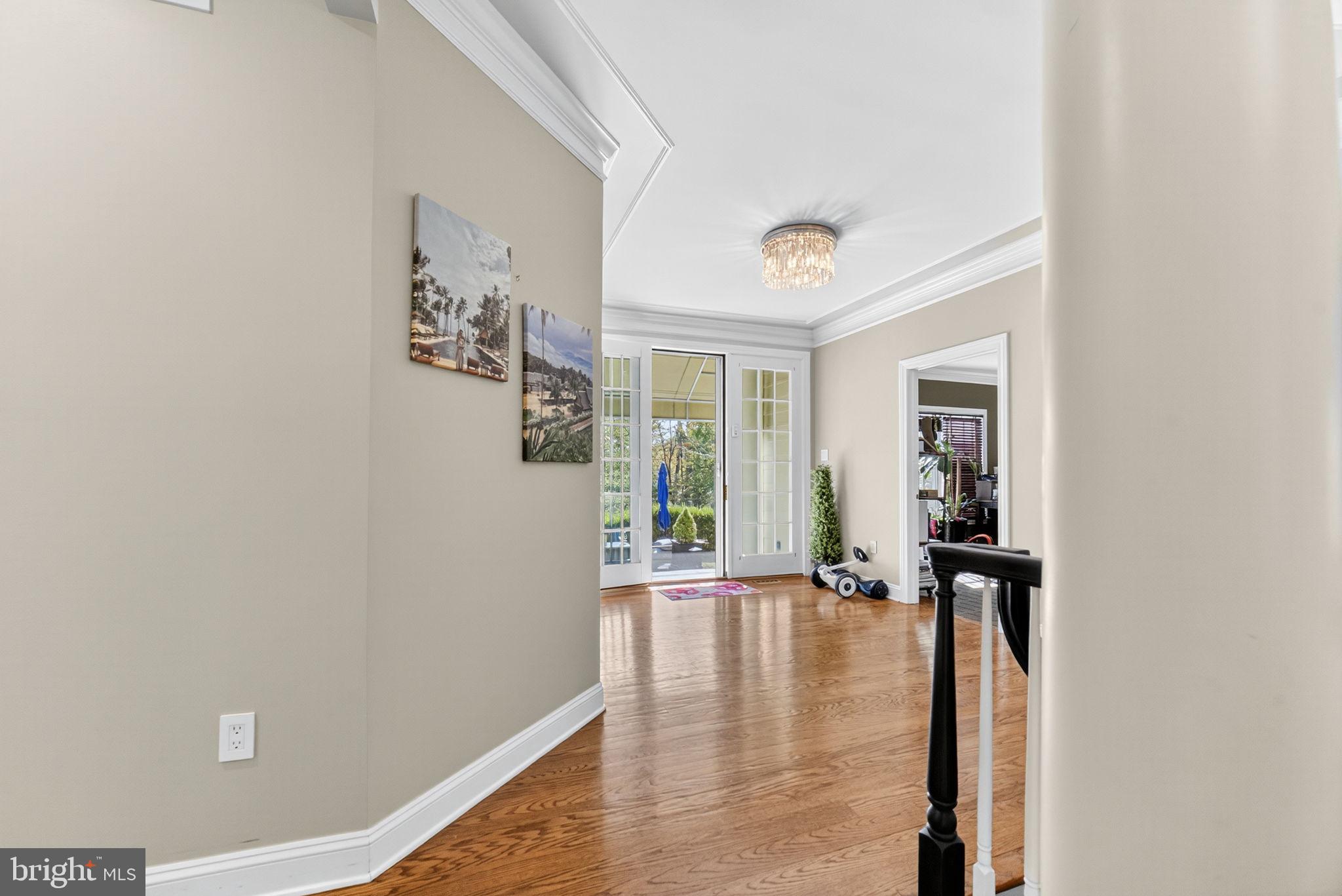 5765 Valley Stream Drive Doylestown, PA 18902 - Photo 20 of 60 Hallway to den/study and patio
