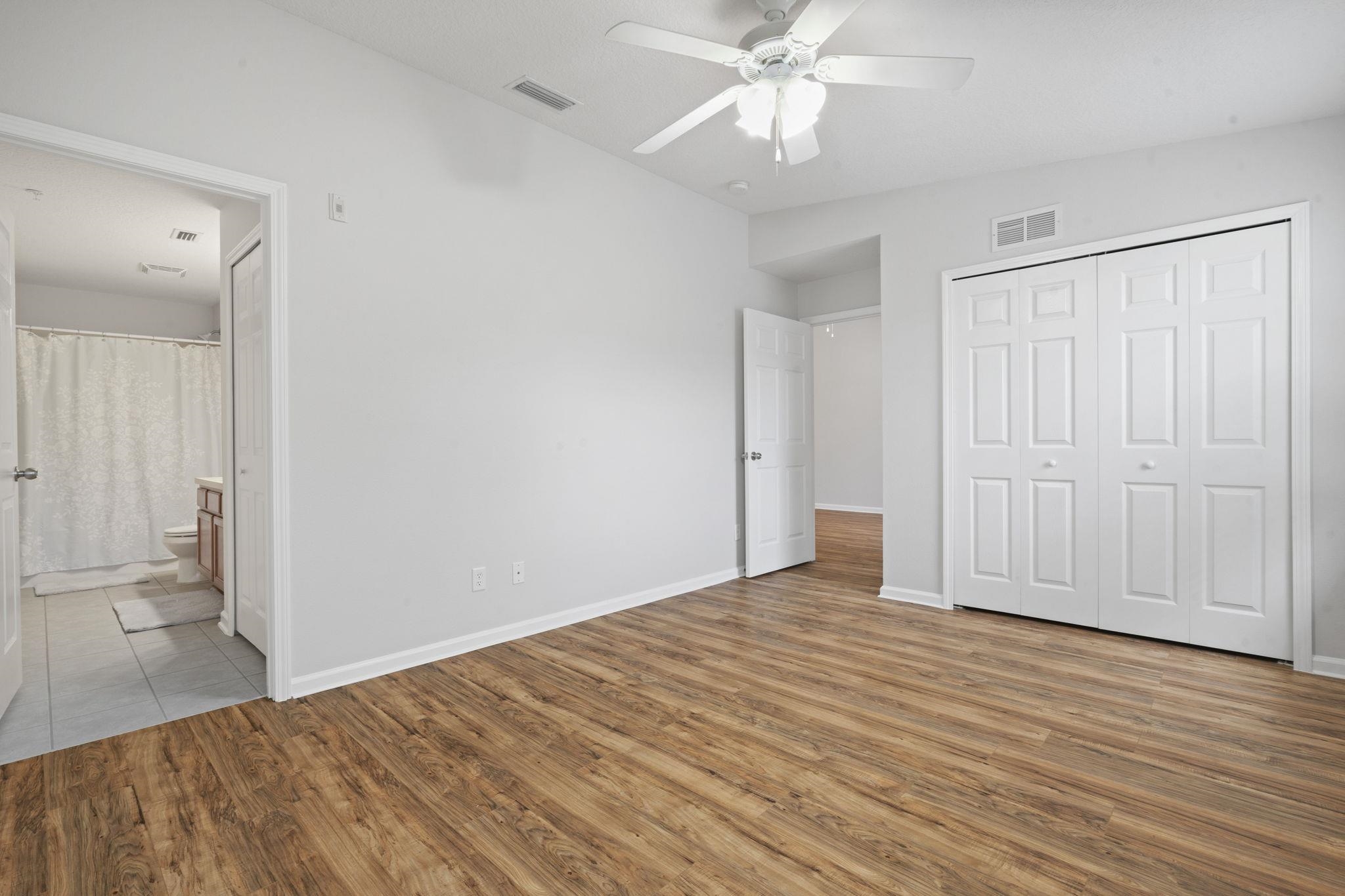 2441 Golden Lake Loop St. Augustine, FL 32084 - Photo 19 of 34 a view of empty room with wooden floor