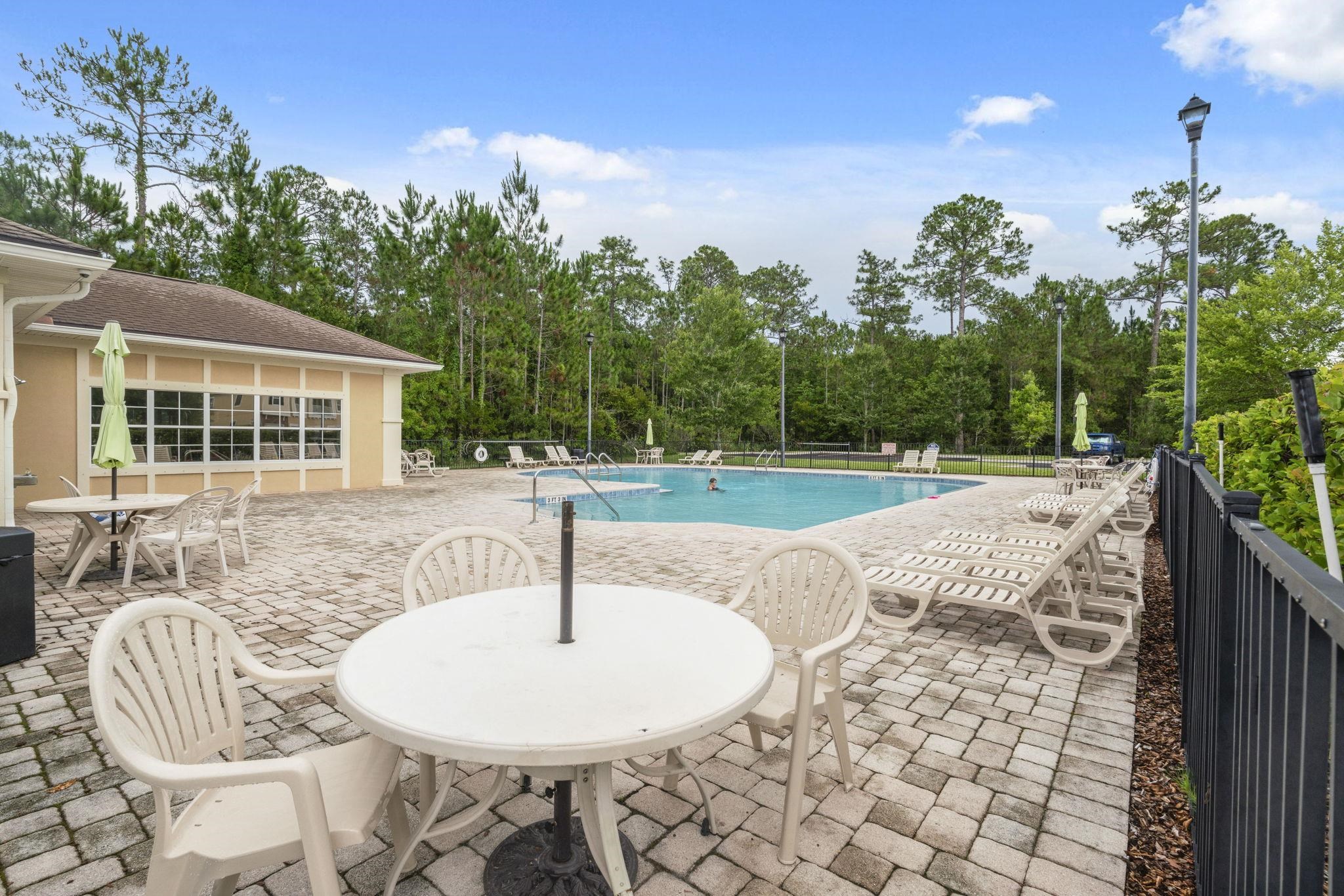 2441 Golden Lake Loop St. Augustine, FL 32084 - Photo 31 of 34 a table and chairs in the patio