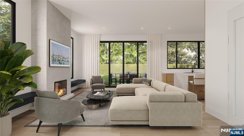 23 Benjamin Road Tenafly, NJ 07670 - Photo 4 of 6 a living room with furniture and a large window