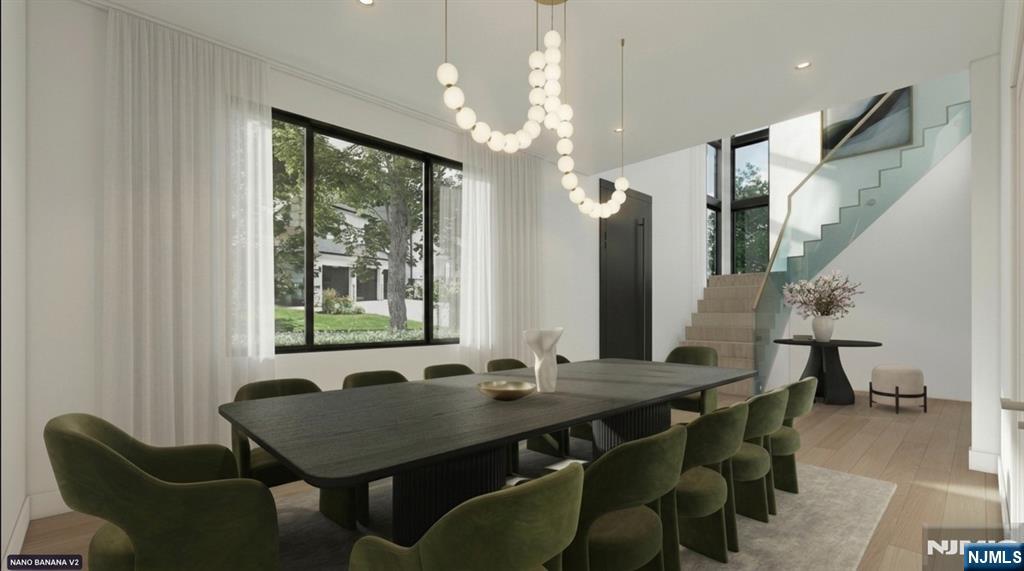 23 Benjamin Road Tenafly, NJ 07670 - Photo 5 of 6 a view of a dining room with furniture and a chandelier