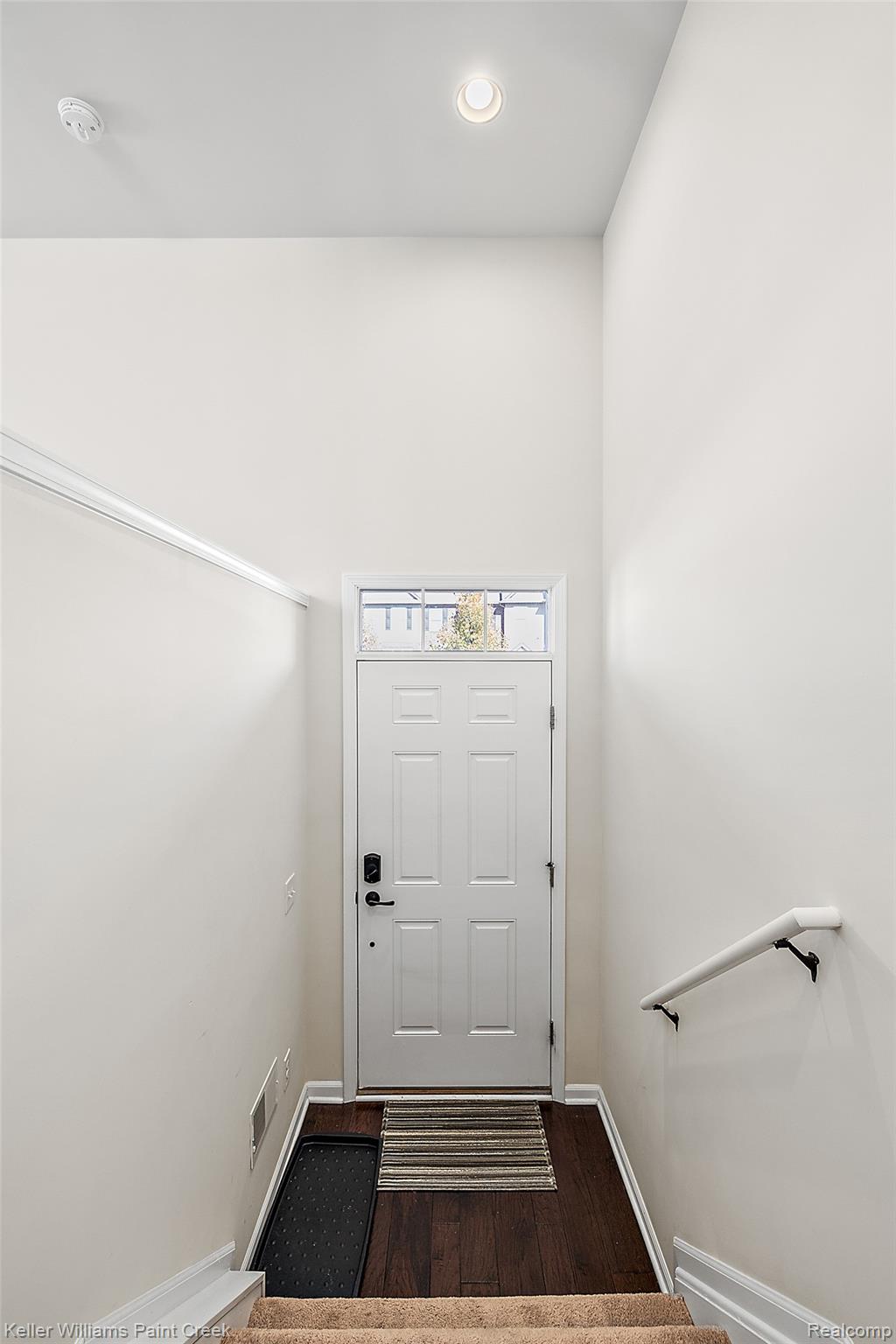 314 Glenhurst Boulevard Rochester, MI 48307 - Photo 6 of 64 Doorway featuring wood finished floors, a high ceiling, and recessed lighting