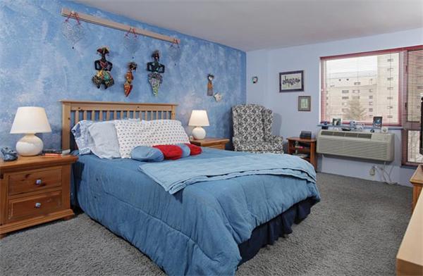 66 Winchester Street, Unit 401 Brookline, MA 02446 - Photo 4 of 5 a bedroom with bed and a large window