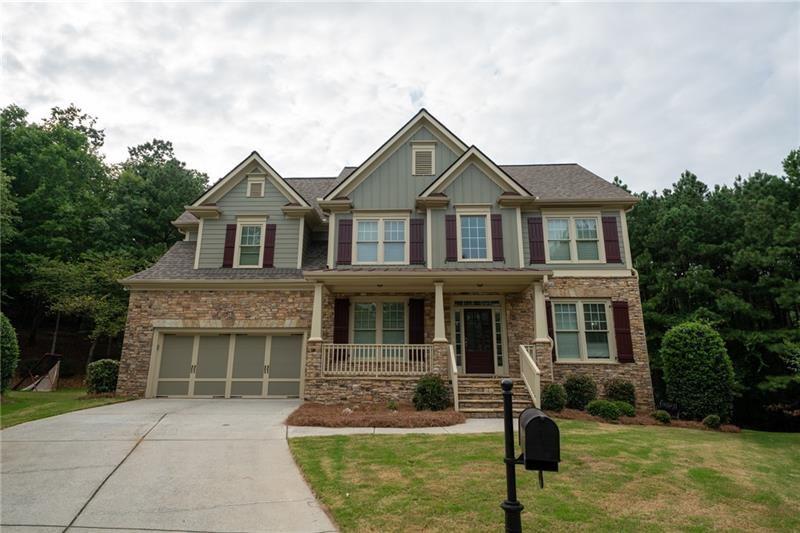 3245 Sparling Street Cumming, GA 30041 - Photo 1 of 59 a front view of a house with garden