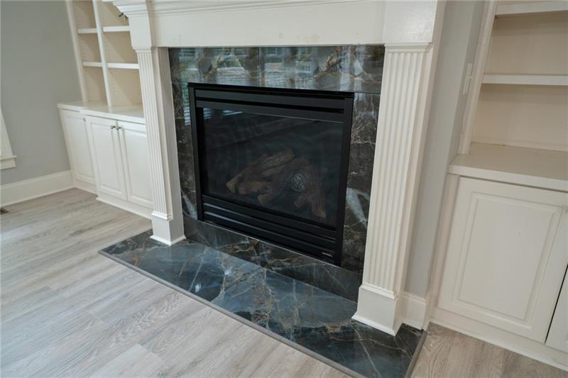 3245 Sparling Street Cumming, GA 30041 - Photo 13 of 59 a stove top oven sitting inside of a kitchen