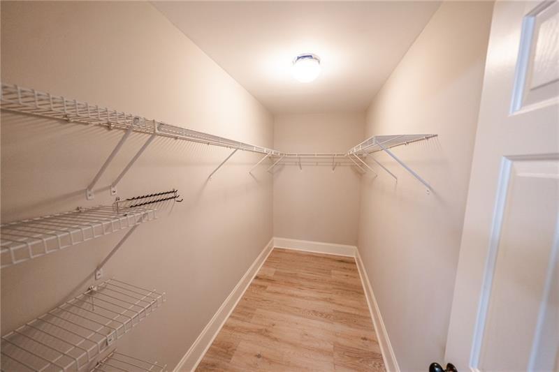 3245 Sparling Street Cumming, GA 30041 - Photo 28 of 59 a view of a room with racks on the wall