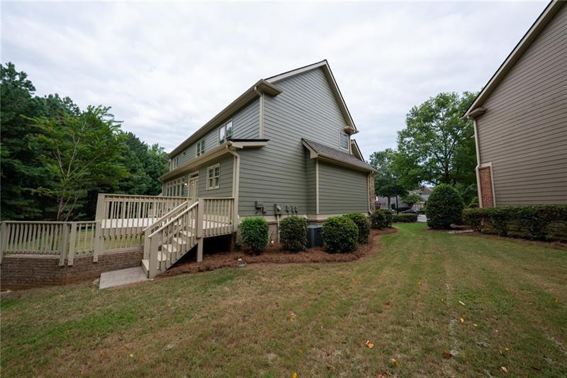 3245 Sparling Street Cumming, GA 30041 - Photo 52 of 59 a view of a house with wooden fence