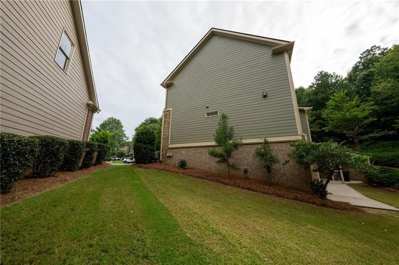 3245 Sparling Street Cumming, GA 30041 - Photo 53 of 59 a house view with a backyard space
