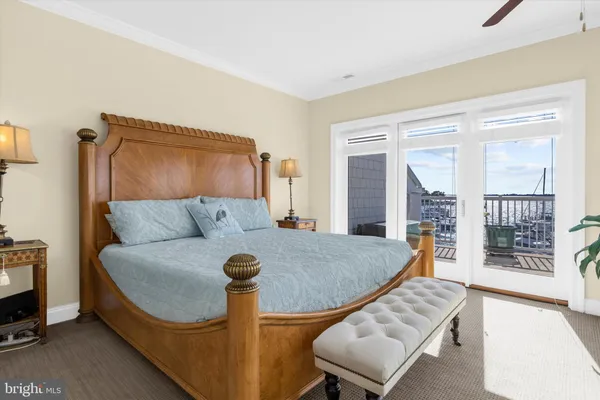 a balcony with a table and chairs