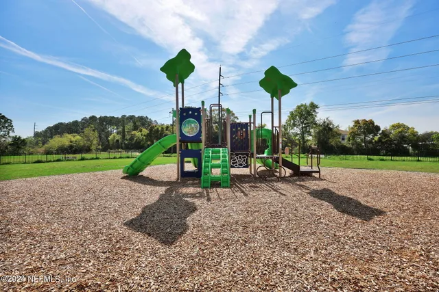 a view of swimming pool with a backyard