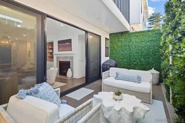 a outdoor living space with furniture and garden view