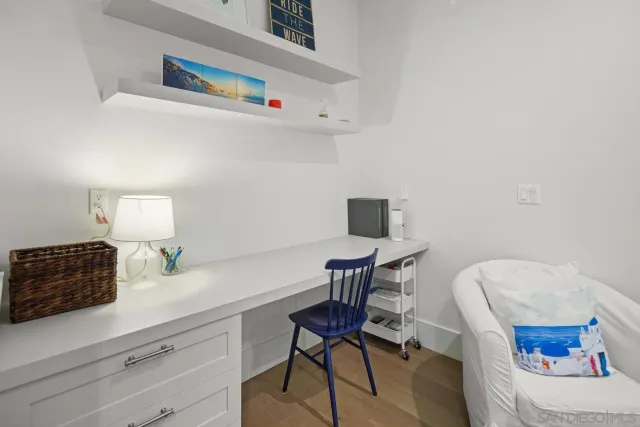 a workspace with furniture and lamp