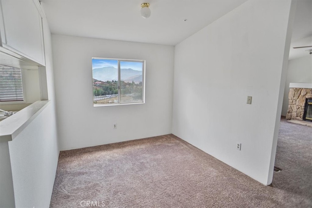 34525 Red Rover Mine Road Acton, CA 93510 - Photo 9 of 23 an empty room with windows and closet
