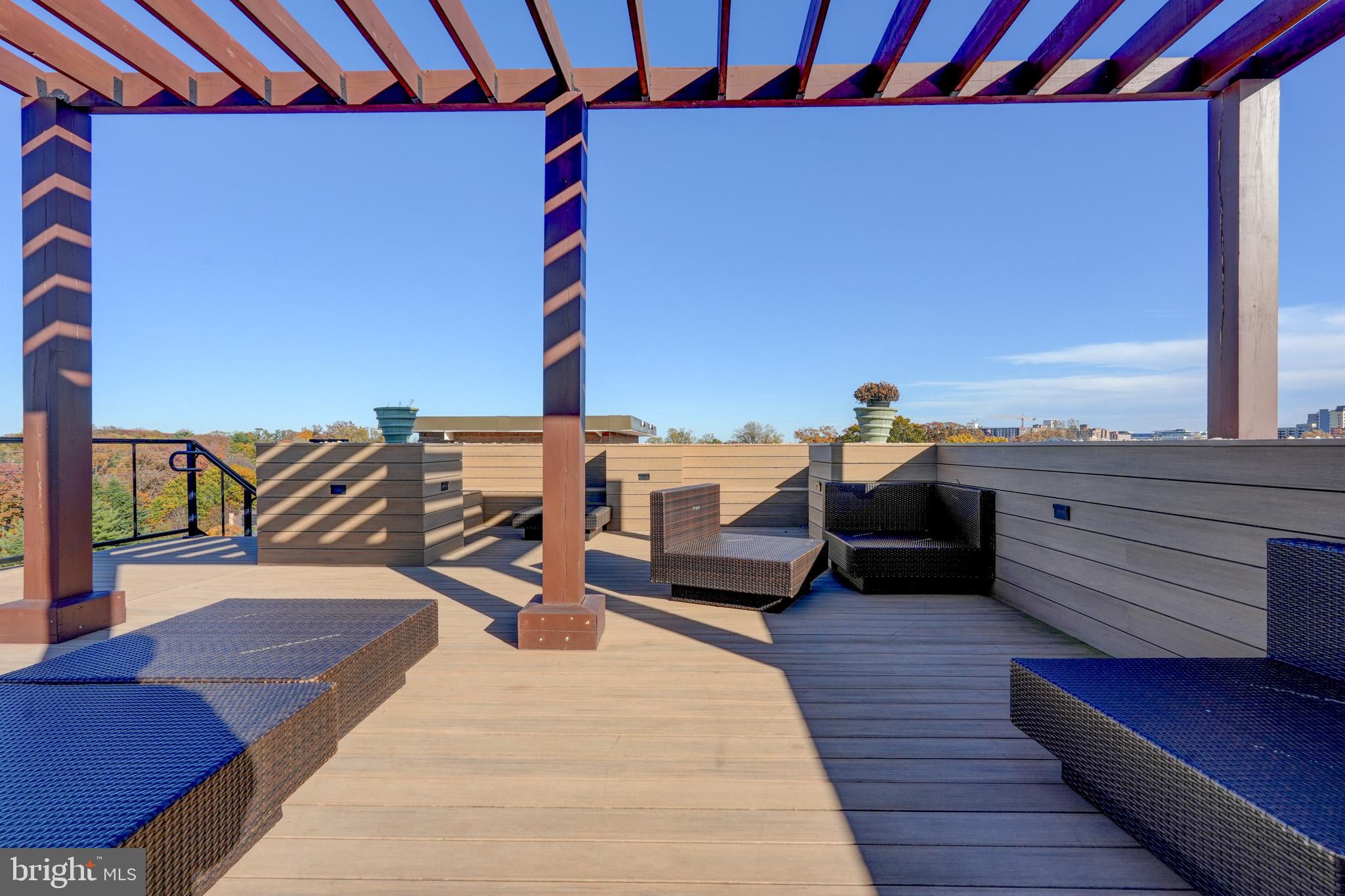 1900 Lyttonsville Road, Unit 211 Silver Spring, MD 20910 - Photo 43 of 46 a bedroom with furniture and window