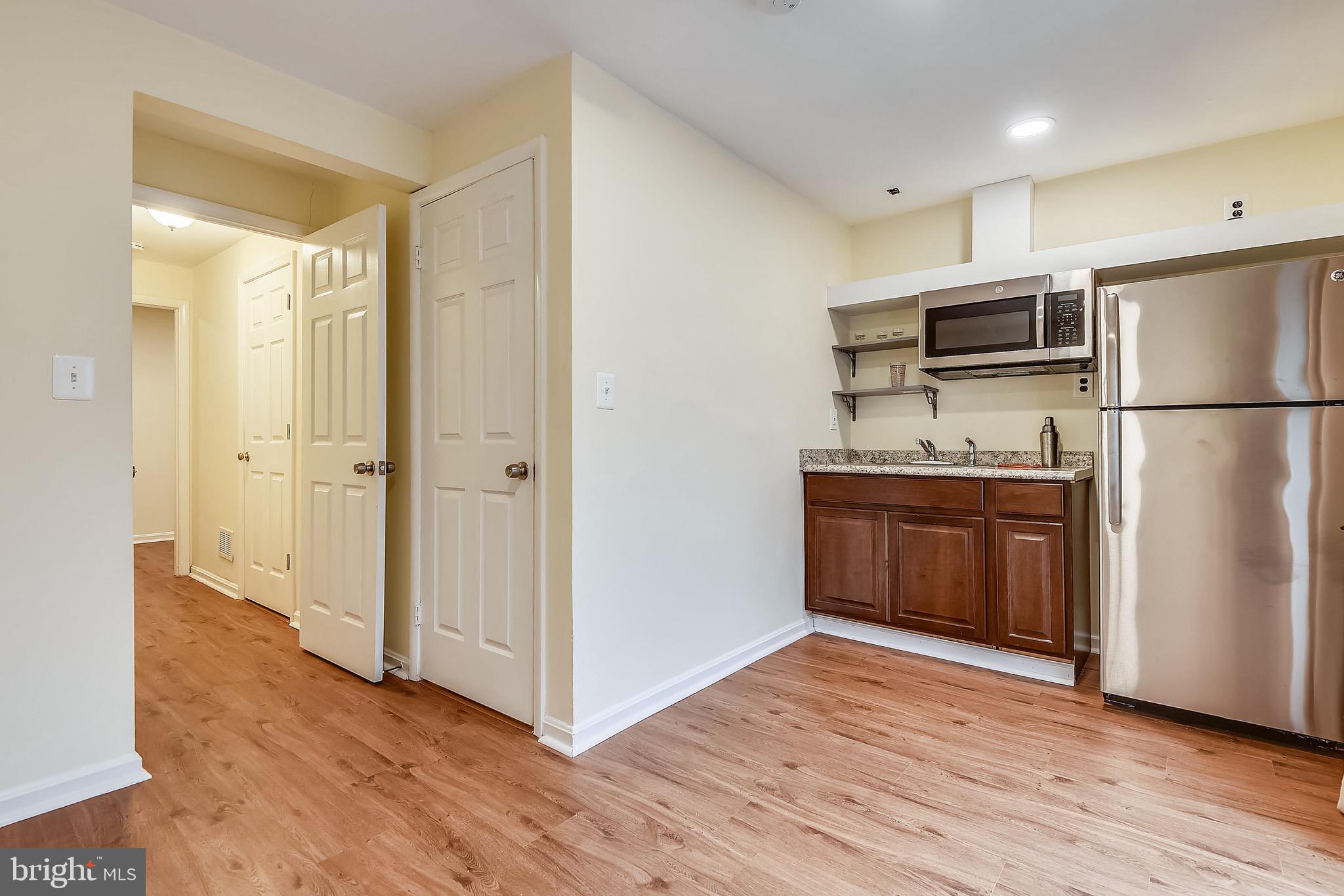 3028 Shepperton Terrace Silver Spring, MD 20904 - Photo 33 of 49 Lower level bonus room with kitchenette.