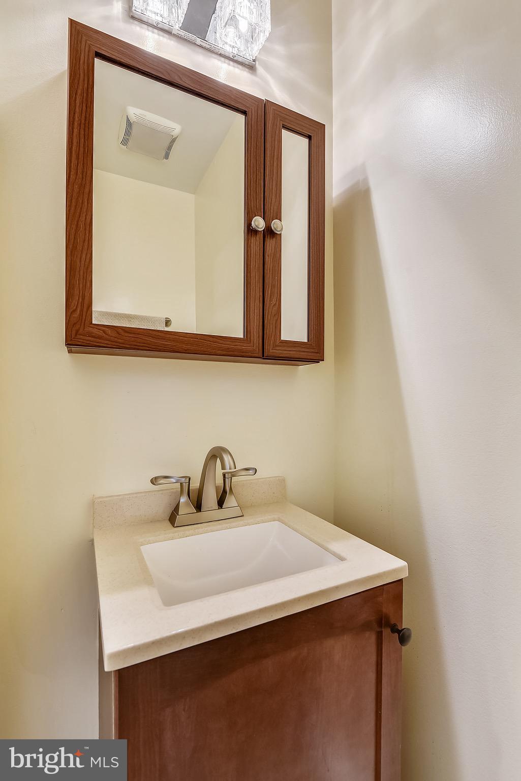 3028 Shepperton Terrace Silver Spring, MD 20904 - Photo 7 of 49 Main level powder room- all new fixtures.
