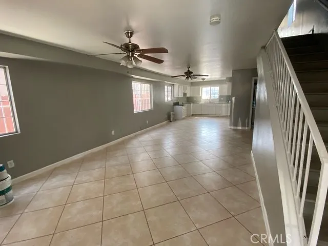 a view of a livingroom with a staircase