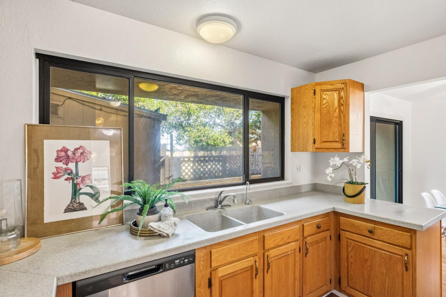 1186 Trinity Avenue Seaside, CA 93955 - Photo 12 of 33 a view of a sink a window and a mirror