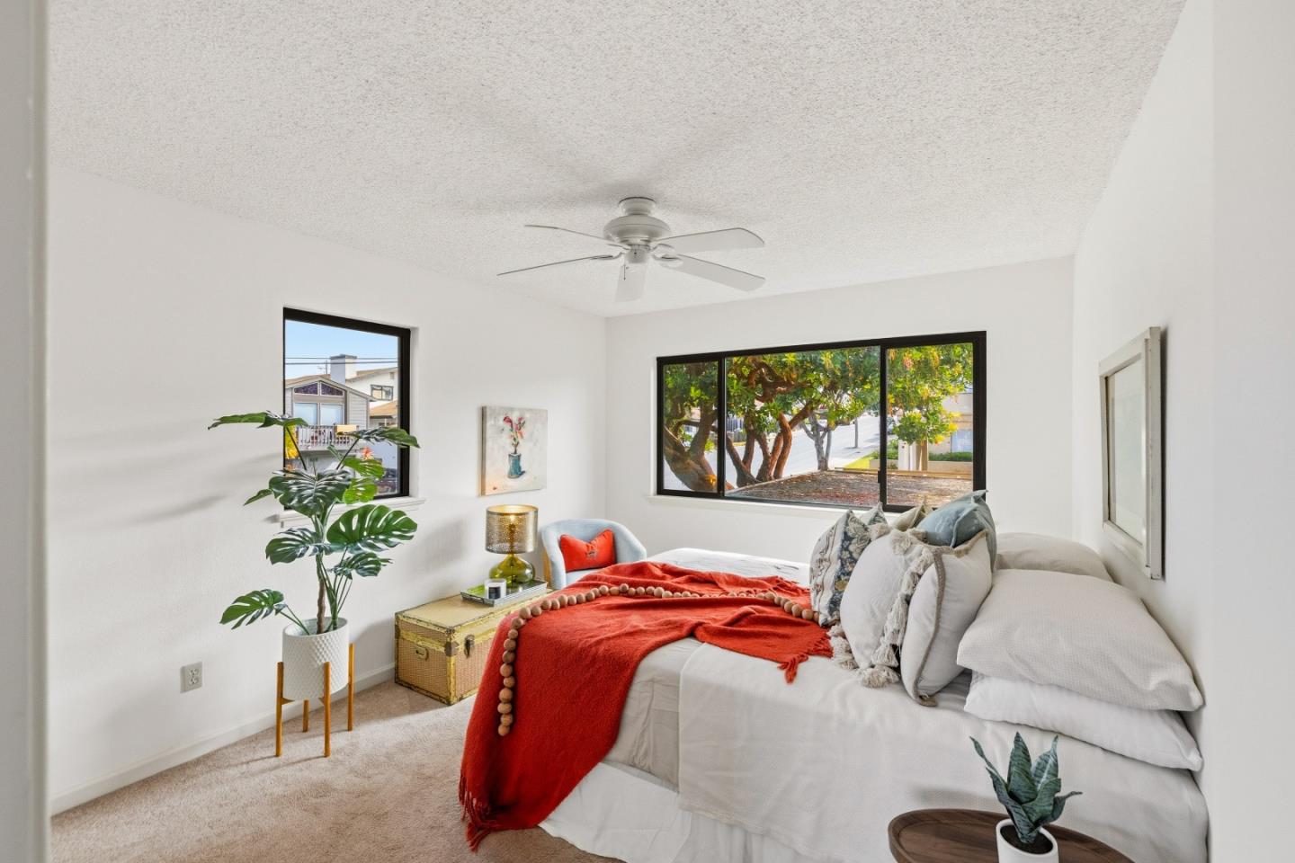 1186 Trinity Avenue Seaside, CA 93955 - Photo 14 of 33 a bed sitting in a bedroom next to a window
