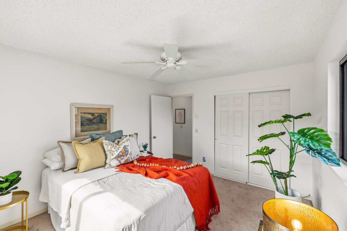 1186 Trinity Avenue Seaside, CA 93955 - Photo 15 of 33 a bedroom with bed and a chandelier