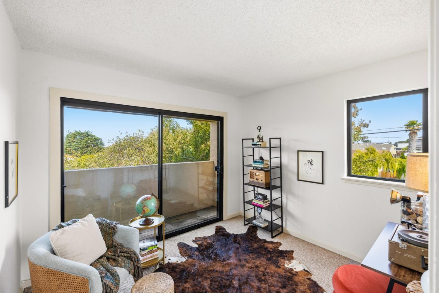 1186 Trinity Avenue Seaside, CA 93955 - Photo 24 of 33 a living room with a couch and a large window