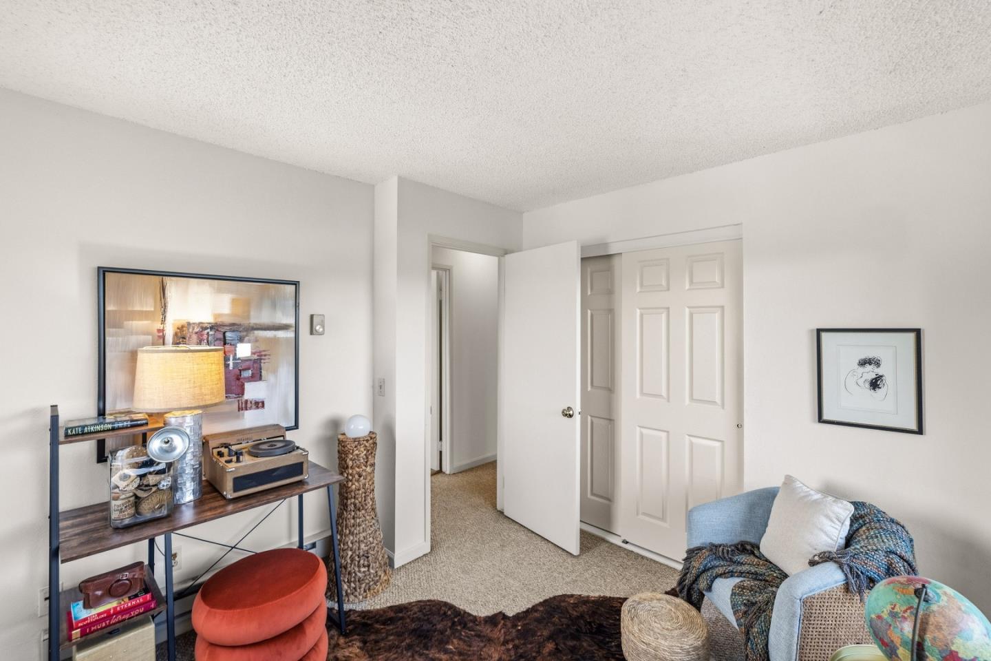 1186 Trinity Avenue Seaside, CA 93955 - Photo 25 of 33 a living room with furniture and a wooden floor