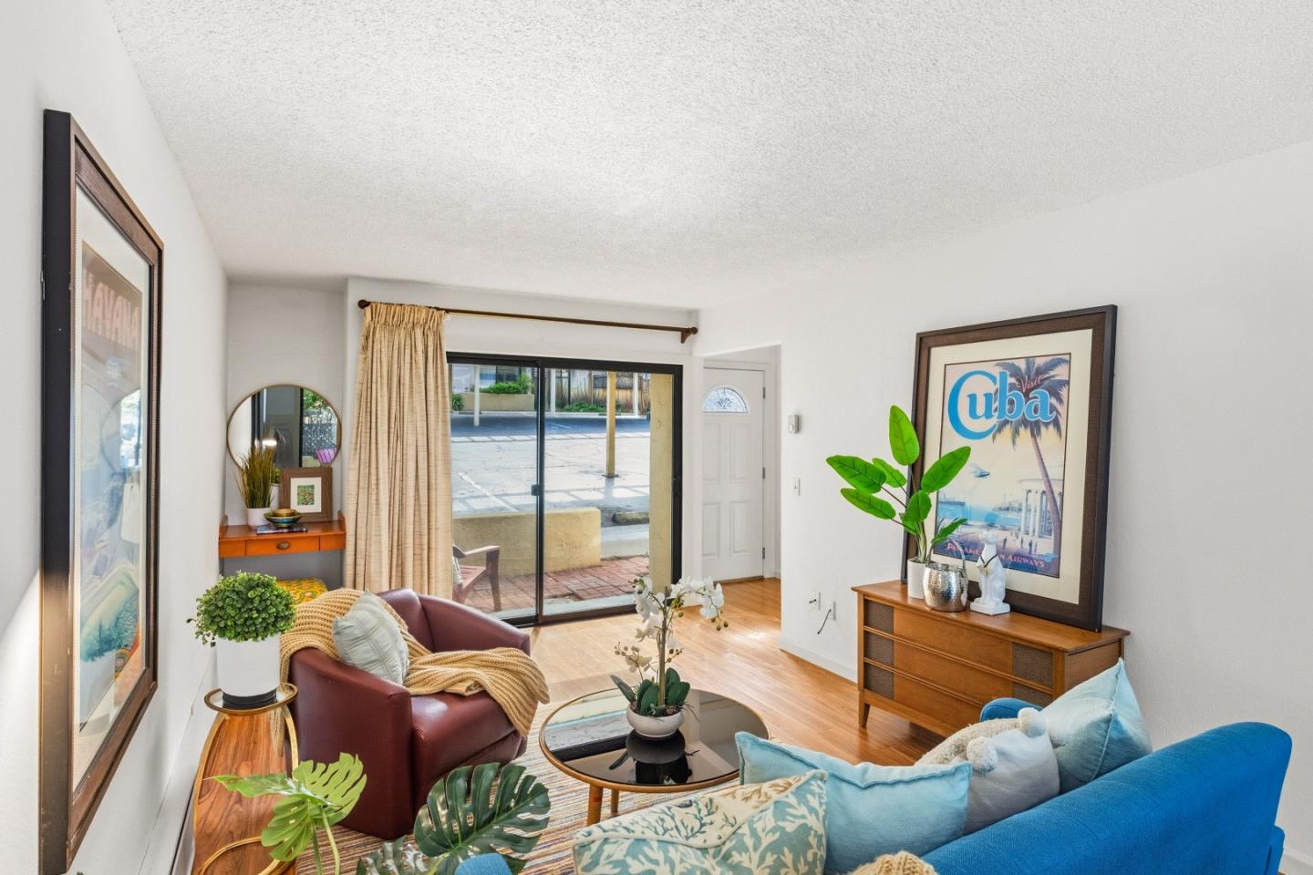 1186 Trinity Avenue Seaside, CA 93955 - Photo 5 of 33 a living room with furniture potted plant and a window