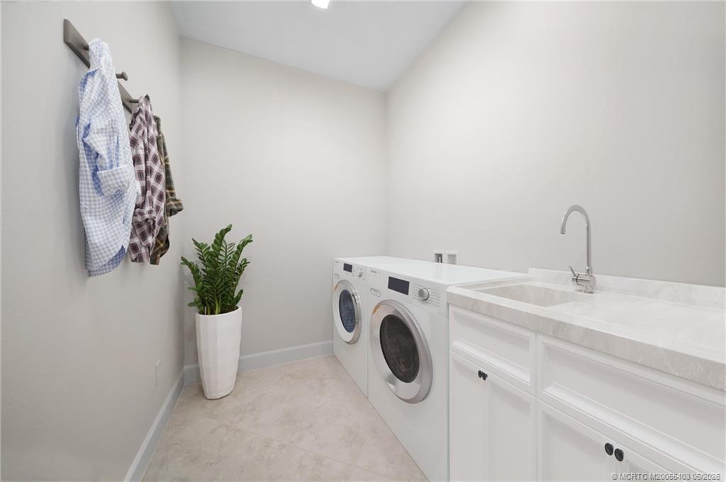 3653 Magnolia Rdg Lane Palm City, FL 34990 - Photo 14 of 17 Laundry room staged