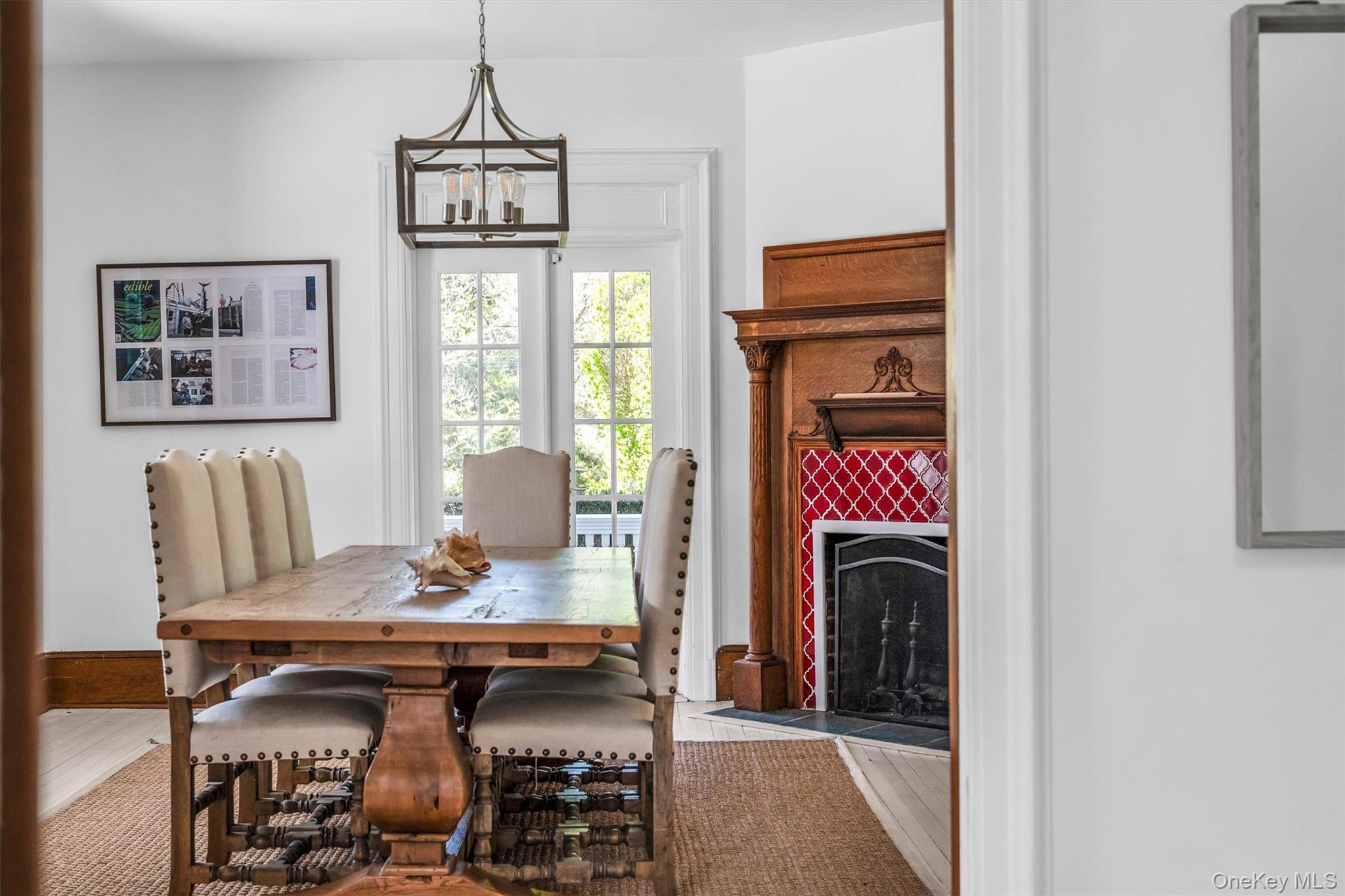 64 South Howells Point Road Bellport, NY 11713 - Photo 17 of 42 a view of a dining room with furniture window and outside view
