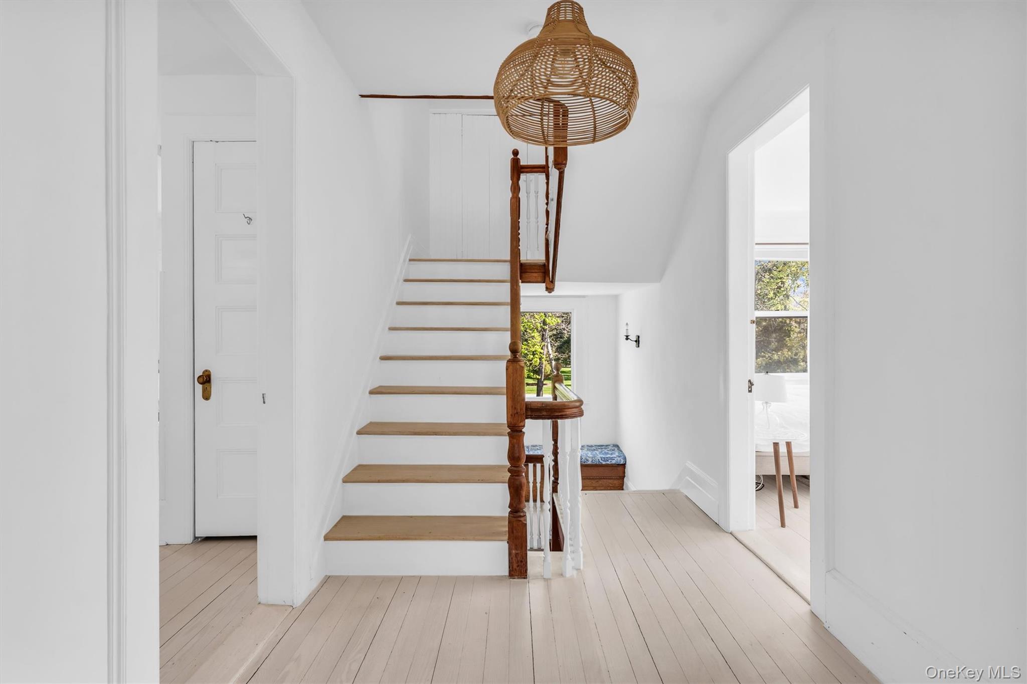 64 South Howells Point Road Bellport, NY 11713 - Photo 19 of 42 a view of entryway with wooden floor