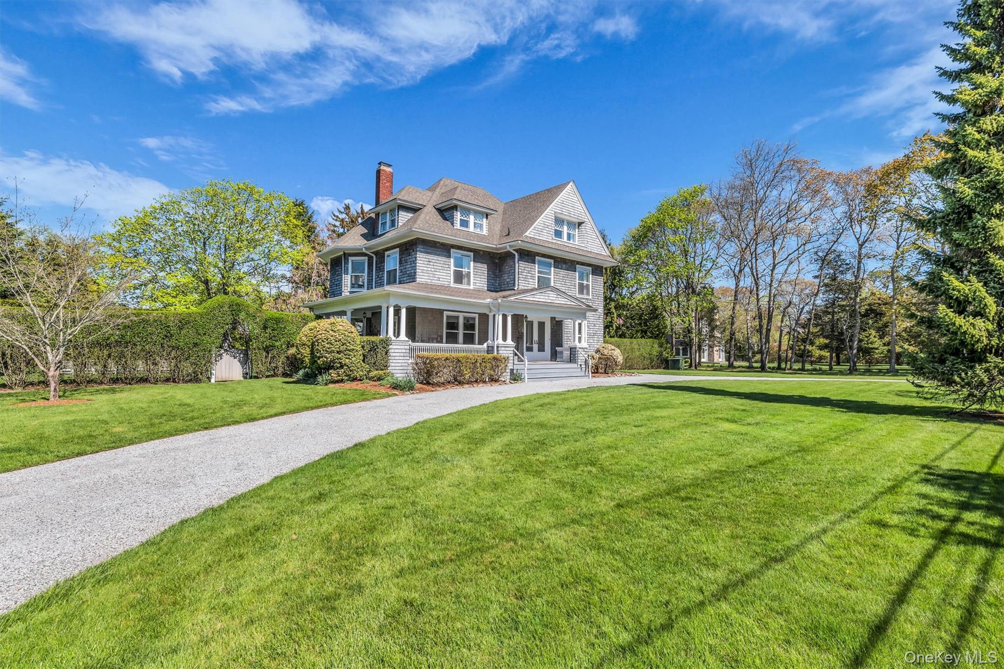64 South Howells Point Road Bellport, NY 11713 - Photo 4 of 42 a view of a house with a big yard