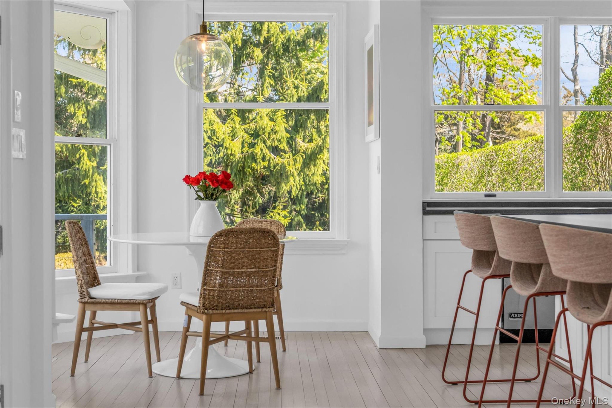 64 South Howells Point Road Bellport, NY 11713 - Photo 10 of 42 a dining room with furniture and a window
