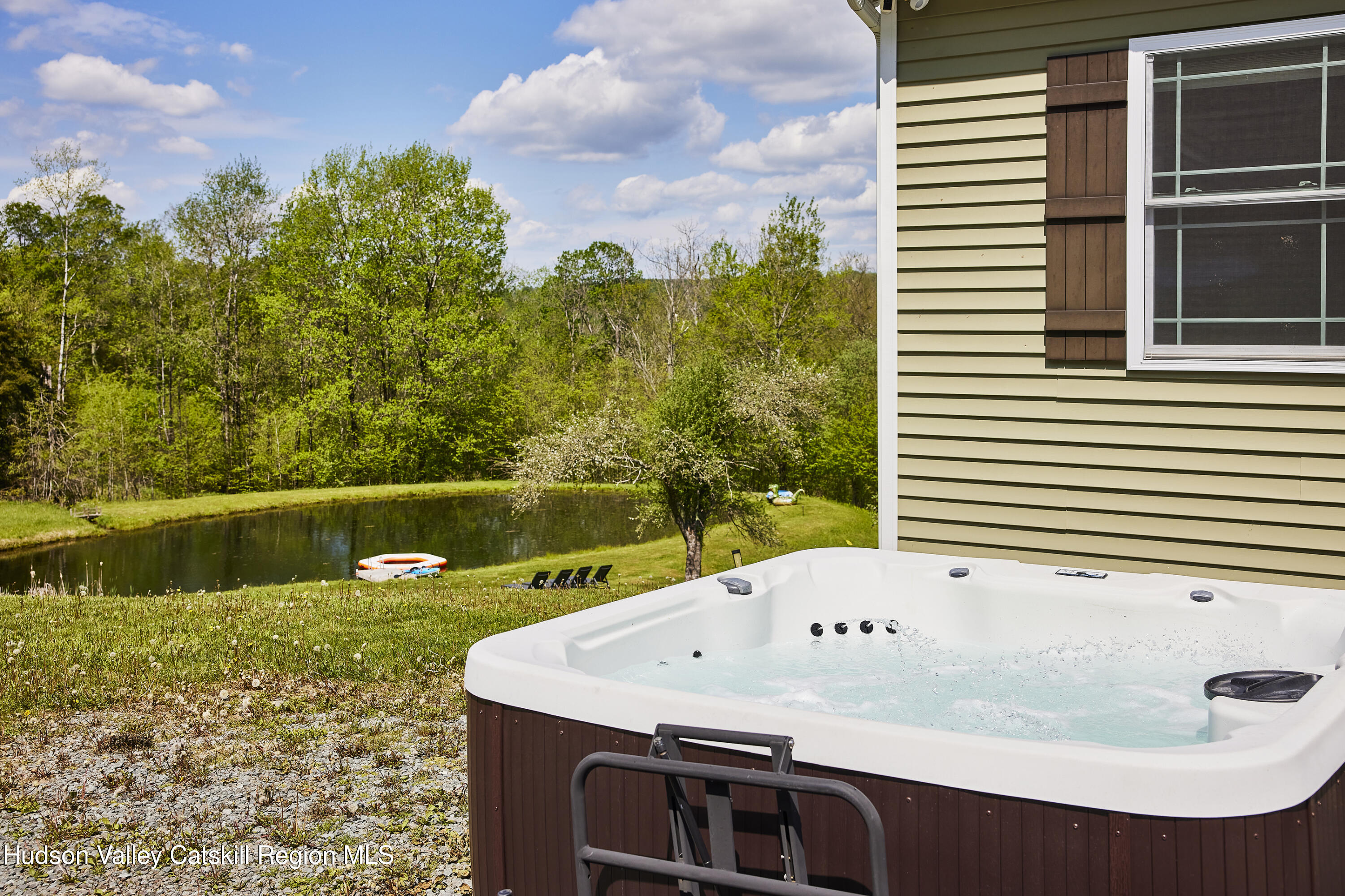 55 Hunter Road Parksville, NY 12768 - Photo 31 of 35 a view of a swimming pool with a yard
