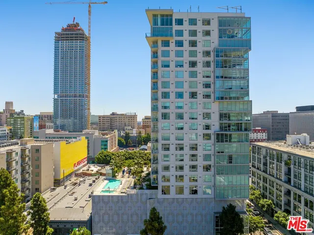 a view of a city with tall buildings