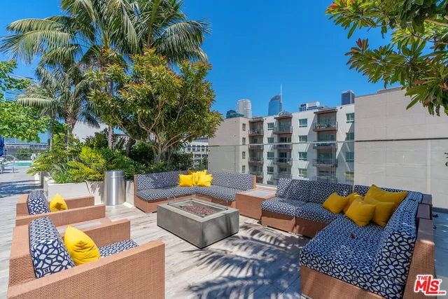 a view of a patio with swimming pool