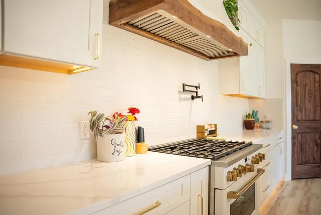 a view of a hallway view with wooden floor and furniture