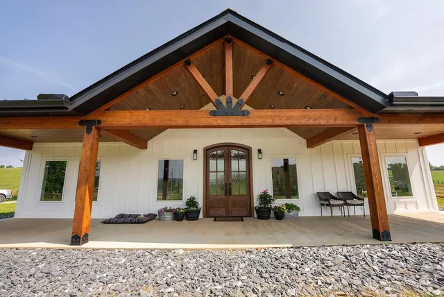 a view of a lake with houses in the back