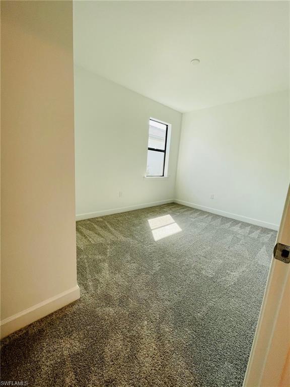 1962 Tripletail Lane Naples, FL 34114 - Photo 22 of 39 an empty room with windows