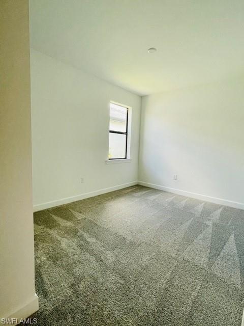 1962 Tripletail Lane Naples, FL 34114 - Photo 25 of 39 an empty room with a window
