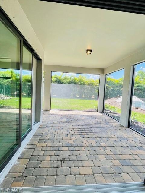 1962 Tripletail Lane Naples, FL 34114 - Photo 28 of 39 a view of an empty room and window