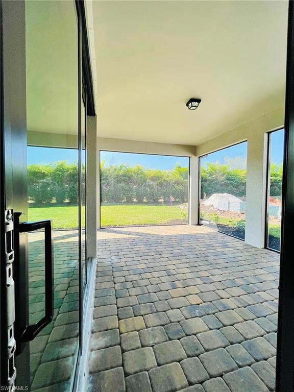 1962 Tripletail Lane Naples, FL 34114 - Photo 31 of 39 a view of an empty room and window