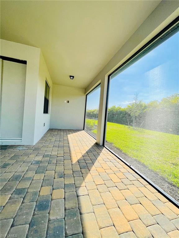 1962 Tripletail Lane Naples, FL 34114 - Photo 33 of 39 a view of an empty room and window